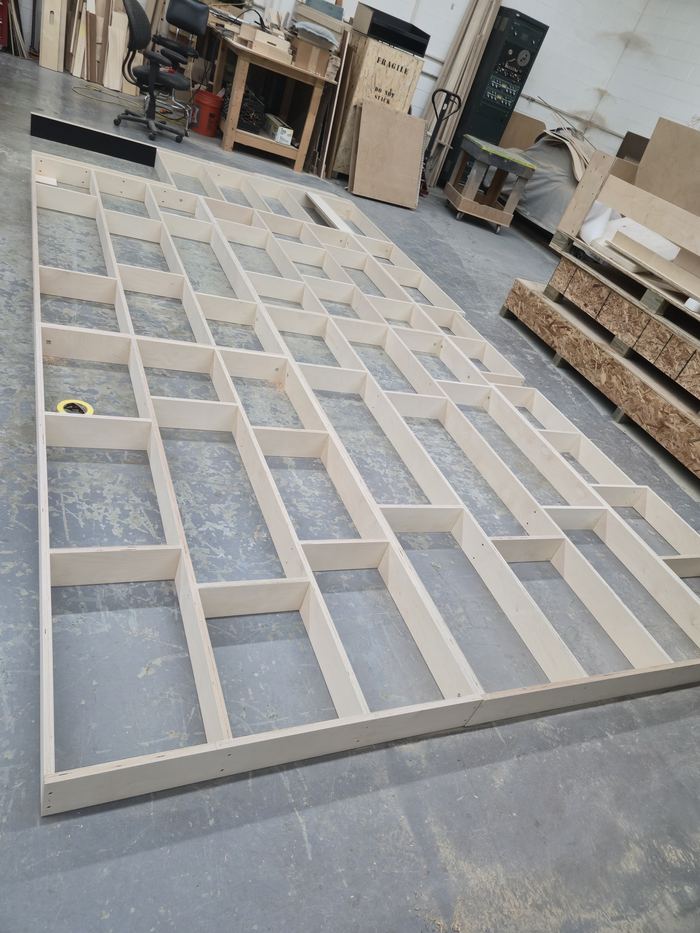 Wall panel installation during interior fit-out